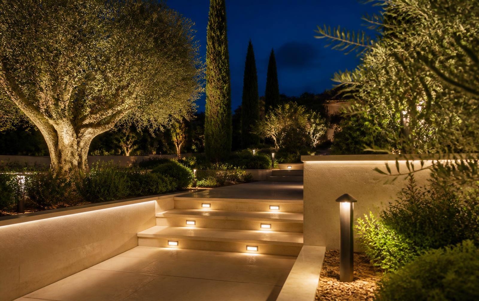 Villa A68 garden lounge and walkway at night